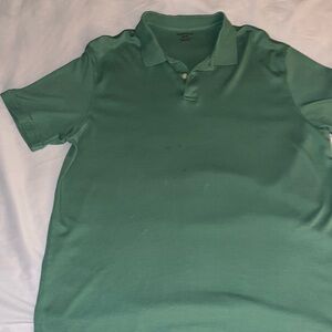 Men’s green Van Huesen polo style shirt.